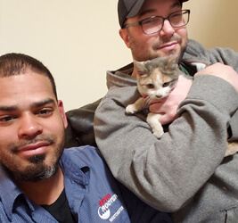 Moises Monsanto and rescued cat