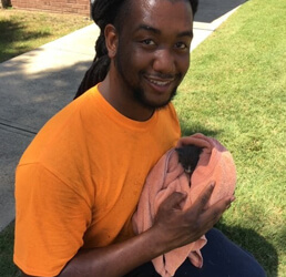 Andron Reed and rescued kitten