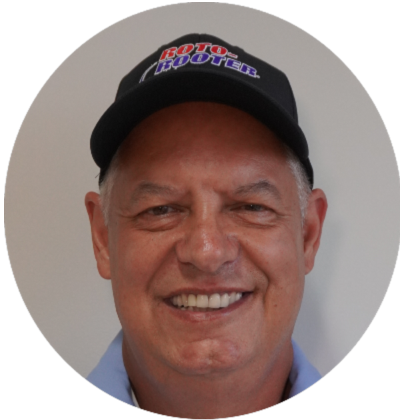 Master plumber from Dayton smiling.