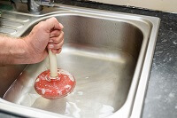 kitchen sink with plunger